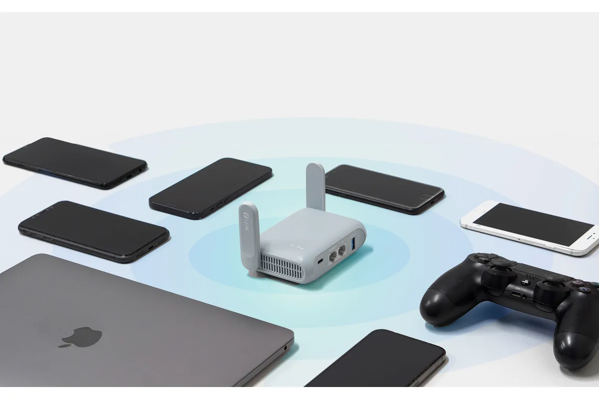 best travel router setup in hotel room with laptop